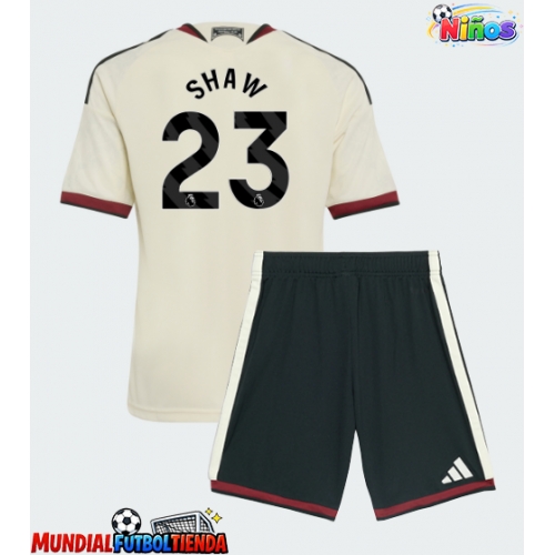 Camiseta Manchester United Luke Shaw #23 Tercera Equipación Replica 2026-27 para niños mangas cortas (+ Pantalones cortos)